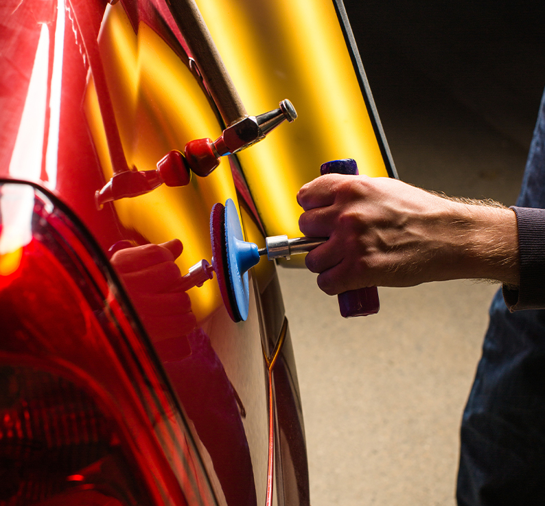 paintless repair red car